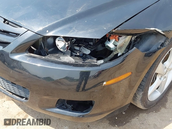 2007 Mazda 6 i Sport VE with VIN 1YVHP84C975M20607, listed as a IAAI auction lot 39658791 with 139,407 mi miles and . Bid and sale history available at DreamBid. Image 6.