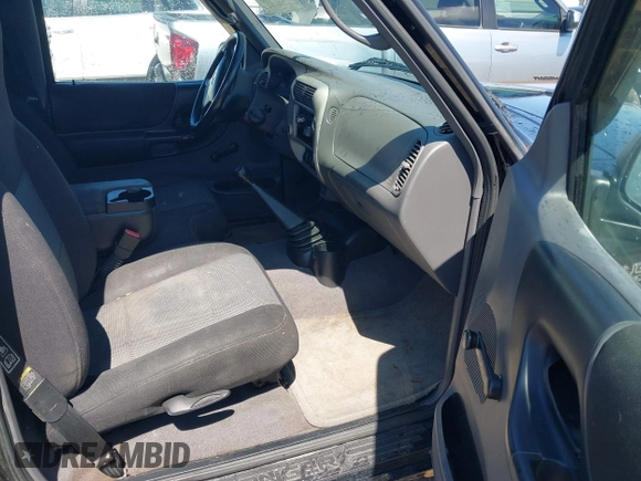 2003 Ford Ranger XL with VIN 1FTYR10D13PB63124, listed as a IAAI auction lot 41876969 with 164,574 mi miles. Bid and sale history available at carsss.com. Image 5.