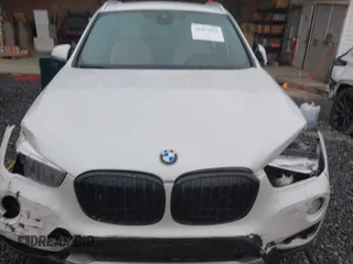 2017 BMW X1 xDrive28i with VIN WBXHT3C36H5F74818, listed as a IAAI auction lot 41853836 with 71,735 mi miles and . Bid and sale history available at DreamBid. Image 12.