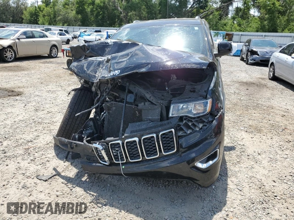 2018 Jeep Grand Cherokee Laredo E with VIN 1C4RJEAG1JC354221, listed as a Copart auction lot 58002715 with 108,223 mi miles and Salvage title. Bid and sale history available at DreamBid. Image 5.