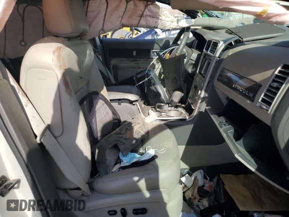 2007 Lincoln MKX z VIN 2LMDU88C07BJ26919, wystawiony jako Copart lot #55778005 z przebiegiem Nie podano mil oraz Szkoda całkowita • Salvage title. Historia ofert i sprzedaży dostępna na DreamBid. Obrazek 7.