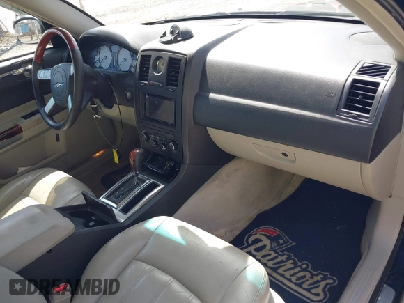 2005 Chrysler 300 C with VIN 2C3JA63HX5H124452, listed as a IAAI auction lot 41877404 with 93,972 mi miles and . Bid and sale history available at DreamBid. Image 5.