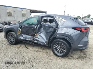 2023 Lexus NX 250 z VIN 2T2ADCAZXPC003877, wystawiony jako Copart lot #54596895 z przebiegiem 14 597 mil mil oraz Szkoda całkowita • Salvage title. Historia ofert i sprzedaży dostępna na DreamBid. Obrazek 2.