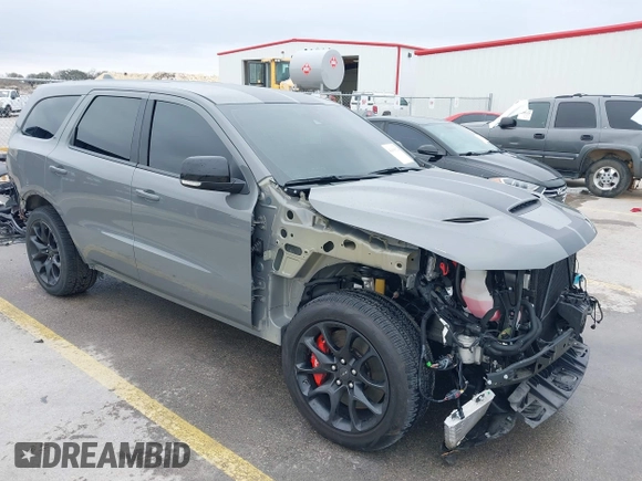2021 Dodge Durango SRT Hellcat with VIN 1C4SDJH92MC605759, listed as a IAAI auction lot 41639174 with 4,800 mi miles and . Bid and sale history available at DreamBid. Image 1.