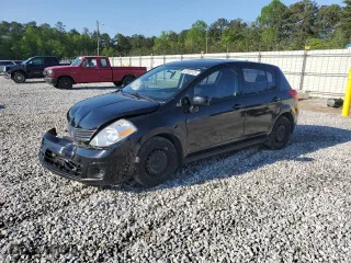 2009 Nissan Versa 1.8 SL with VIN 3N1BC13E59L500137, listed as a Copart auction lot 52339125 with 121,643 mi miles and Salvage Title. Bid and sale history available at carsss.com. Image 1.