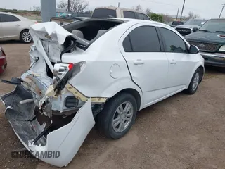 2012 Chevrolet Sonic LS z VIN 1G1JA5SH7C4212837, wystawiony jako IAAI lot #41509997 z przebiegiem 96 901 mil mil oraz . Historia ofert i sprzedaży dostępna na DreamBid. Obrazek 4.