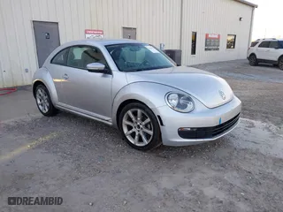 2012 Volkswagen Beetle 2.5L PZEV with VIN 3VWJP7AT9CM602606, listed as a IAAI auction lot 41503442 with 1 mi miles. Bid and sale history available at carsss.com. Image 1.