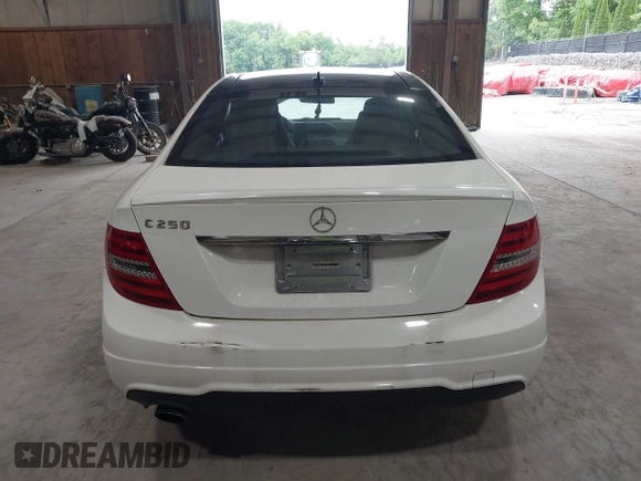 2015 Mercedes-Benz C 250 with VIN WDDGJ4HB5FG375879, listed as a IAAI auction lot 42454524 with 50,588 mi miles and . Bid and sale history available at DreamBid. Image 16.