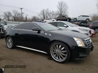 2013 Cadillac CTS z VIN 1G6DA1E31D0154605, wystawiony jako Copart lot #87380334 z przebiegiem 129 114 mil mil oraz Szkoda całkowita • Salvage title. Historia ofert i sprzedaży dostępna na DreamBid. Obrazek 4.