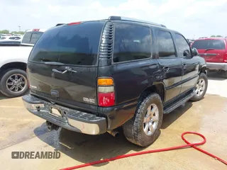 2003 GMC Yukon SLT z VIN 1GKEC13Z43R262475, wystawiony jako IAAI lot #42306438 z przebiegiem 209 436 mil mil oraz . Historia ofert i sprzedaży dostępna na DreamBid. Obrazek 4.