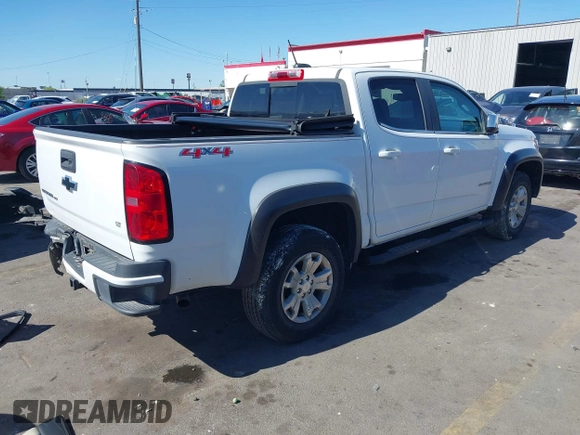 2018 Chevrolet Colorado 4WD LT with VIN 1GCGTCEN4J1297748, listed as a IAAI auction lot 42181410 with 92,649 mi miles and . Bid and sale history available at DreamBid. Image 4.