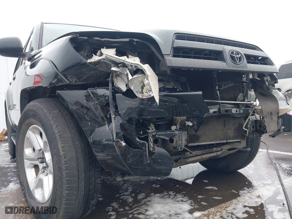 2005 Toyota 4Runner SR5 with VIN JTEBU14R950077268, listed as a IAAI auction lot 41588206 with 188,870 mi miles. Bid and sale history available at carsss.com. Image 6.