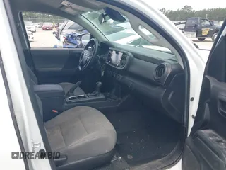2022 Toyota Tacoma SR with VIN 3TYCZ5AN9NT098903, listed as a IAAI auction lot 42088505 with 93,000 mi miles and . Bid and sale history available at DreamBid. Image 5.