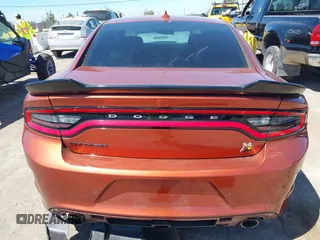2020 Dodge Charger Scat Pack z VIN 2C3CDXGJ7LH223858, wystawiony jako IAAI lot #42221044 z przebiegiem 42 561 mil mil oraz . Historia ofert i sprzedaży dostępna na DreamBid. Obrazek 16.