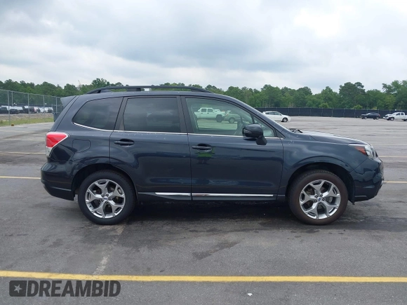2018 Subaru Forester Touring with VIN JF2SJAWC2JH492788, listed as a IAAI auction lot 42358591 with 83,354 mi miles and . Bid and sale history available at DreamBid. Image 13.