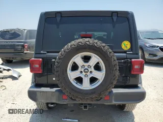 2020 Jeep Wrangler Sport with VIN 1C4GJXAGXLW237080, listed as a Copart auction lot 57769704 with 144,137 mi miles and Salvage title. Bid and sale history available at DreamBid. Image 6.