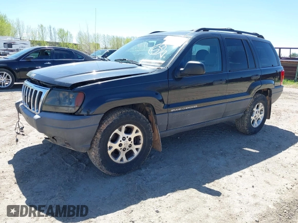 1999 Jeep Grand Cherokee Laredo with VIN 1J4GW58S8XC524502, listed as a IAAI auction lot 42193506 with 147,920 mi miles and . Bid and sale history available at DreamBid. Image 2.
