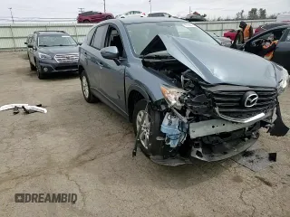2016 Mazda CX-5 Touring with VIN JM3KE4CY9G0647226, listed as a Copart auction lot 51566405 with 77,785 mi miles and Salvage Title. Bid and sale history available at carsss.com. Image 12.