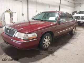 2004 Mercury Grand Marquis LS Premium with VIN 2MEHM75W64X620399, listed as a IAAI auction lot 39965717 with 136,046 mi miles. Bid and sale history available at carsss.com. Image 17.
