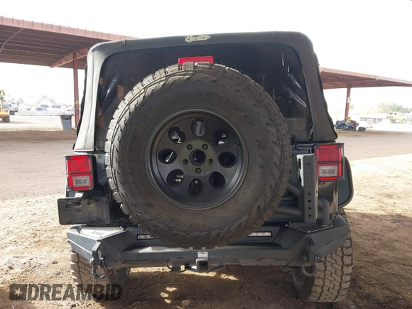 2011 Jeep Wrangler Rubicon with VIN 1J4BA6D13BL545343, listed as a IAAI auction lot 40980056 with 107,207 mi miles and . Bid and sale history available at carsss.com. Image 16.