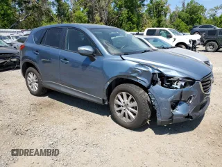 2016 Mazda CX-5 Touring with VIN JM3KE2CY0G0894283, listed as a Copart auction lot 50592065 with 86,400 mi miles and Salvage Title. Bid and sale history available at carsss.com. Image 4.