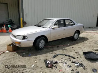 1995 Toyota Camry LE z VIN 4T1SK12E2SU607896, wystawiony jako Copart lot #54621035 z przebiegiem 155 409 mil mil oraz Szkoda całkowita • Salvage title. Historia ofert i sprzedaży dostępna na DreamBid. Obrazek 1.