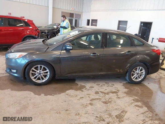 2015 Ford Focus SE with VIN 1FADP3F21FL340262, listed as a IAAI auction lot 41669915 with 134,731 mi miles. Bid and sale history available at carsss.com. Image 14.