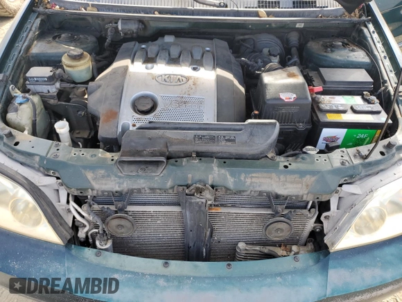 2002 Kia Sedona LX with VIN KNDUP131026325853, listed as a Copart auction lot 65872234 with 114,798 mi miles and Clean Title. Bid and sale history available at carsss.com. Image 12.