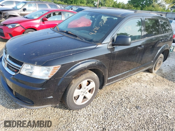 2013 Dodge Journey SE with VIN 3C4PDCAB9DT561701, listed as a IAAI auction lot 42403322 with 143,766 mi miles and . Bid and sale history available at DreamBid. Image 2.