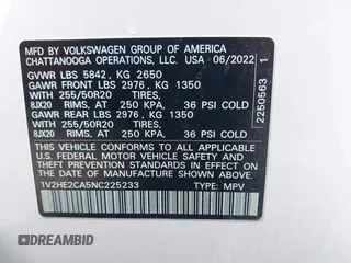 2022 Volkswagen Atlas SE z VIN 1V2HE2CA5NC225233, wystawiony jako IAAI lot #42366811 z przebiegiem 27 986 mil mil oraz . Historia ofert i sprzedaży dostępna na DreamBid. Obrazek 9.