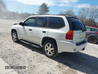 2007 GMC Envoy SLE with VIN 1GKDT13S472223365, listed as a IAAI auction lot 41690531 with 170,539 mi miles. Bid and sale history available at carsss.com. Image 3.