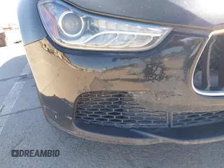 2014 Maserati Ghibli z VIN ZAM57XSA5E1091490, wystawiony jako IAAI lot #41848480 z przebiegiem 129 585 mil mil oraz . Historia ofert i sprzedaży dostępna na DreamBid. Obrazek 17.