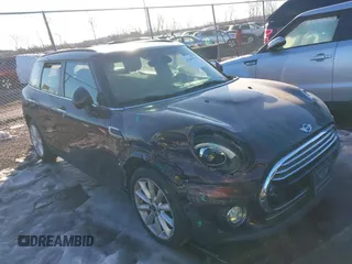2016 MINI Clubman z VIN WMWLN5C50G2E29740, wystawiony jako IAAI lot #41345976 z przebiegiem 67 124 mil mil oraz . Historia ofert i sprzedaży dostępna na DreamBid. Obrazek 1.