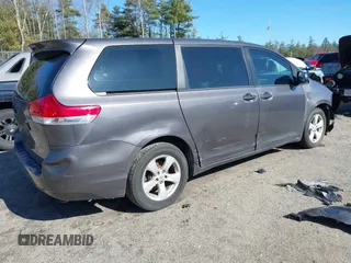 2012 Toyota Sienna with VIN 5TDZK3DC4CS228916, listed as a IAAI auction lot 41936870 with 188,227 mi miles. Bid and sale history available at carsss.com. Image 4.