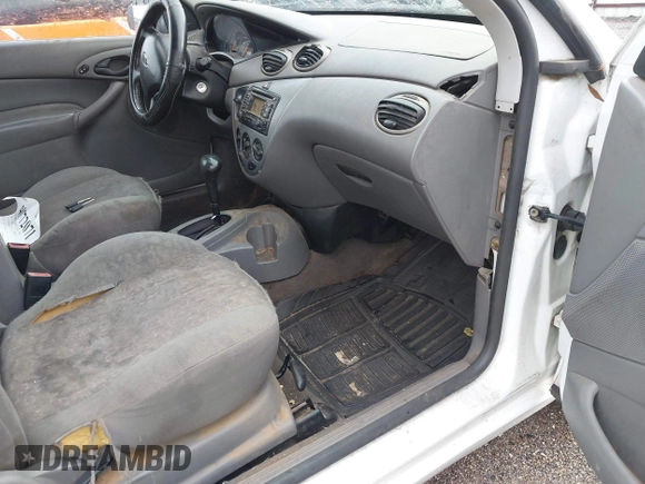 2004 Ford Focus ZX3 with VIN 3FAFP31Z94R120332, listed as a IAAI auction lot 40772071 with 218,128 mi miles and . Bid and sale history available at DreamBid. Image 5.