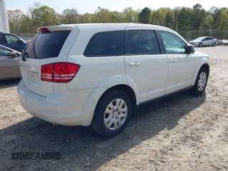 2015 Dodge Journey American Value Pkg with VIN 3C4PDCAB8FT605870, listed as a IAAI auction lot 41930474 with 205,741 mi miles. Bid and sale history available at carsss.com. Image 4.