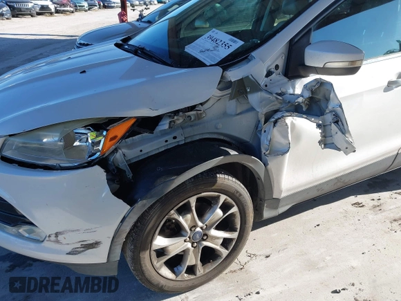 2015 Ford Escape Titanium with VIN 1FMCU0J96FUA48615, listed as a IAAI auction lot 39482355 with 186,340 mi miles and . Bid and sale history available at DreamBid. Image 6.