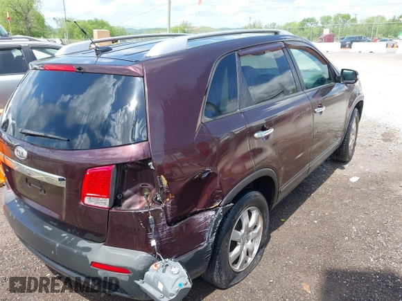 2011 Kia Sorento LX with VIN 5XYKT4A13BG044196, listed as a IAAI auction lot 42080972 with 292,004 mi miles. Bid and sale history available at carsss.com. Image 4.