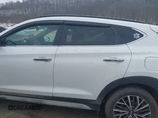 2019 Hyundai Tucson Ultimate with VIN KM8J3CALXKU016834, listed as a IAAI auction lot 40970606 with 104,208 mi miles. Bid and sale history available at carsss.com. Image 14.
