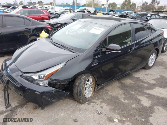 2019 Toyota Prius L Eco with VIN JTDKARFU6K3074058, listed as a IAAI auction lot 41741499 with 70,834 mi miles. Bid and sale history available at carsss.com. Image 2.