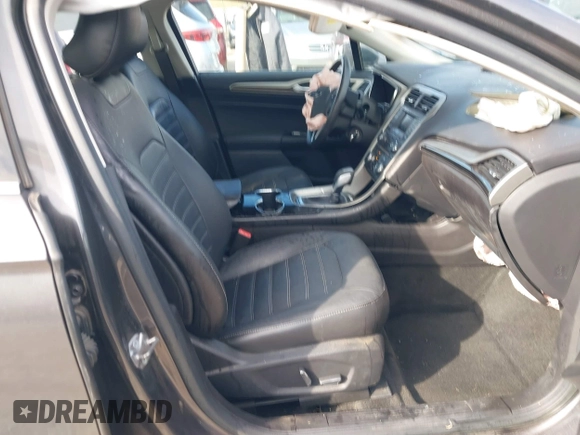 2015 Ford Fusion SE Hybrid with VIN 3FA6P0LUXFR266743, listed as a IAAI auction lot 40862039 with 116,610 mi miles. Bid and sale history available at carsss.com. Image 5.