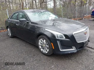 2015 Cadillac CTS Luxury RWD z VIN 1G6AR5S33F0126010, wystawiony jako IAAI lot #42037732 z przebiegiem 142 630 mil mil oraz . Historia ofert i sprzedaży dostępna na DreamBid. Obrazek 1.