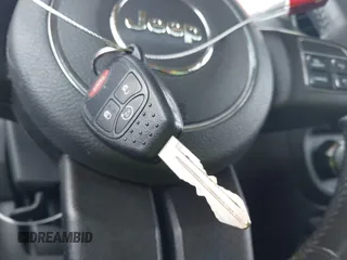 2014 Jeep Patriot Latitude with VIN 1C4NJRFB0ED628074, listed as a IAAI auction lot 41946451 with 92,118 mi miles and . Bid and sale history available at carsss.com. Image 11.
