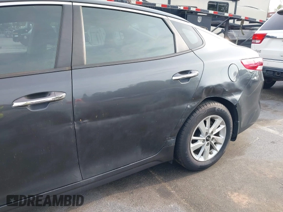 2016 Kia Optima LX with VIN KNAGT4L33G5107444, listed as a IAAI auction lot 41971006 with 174,997 mi miles. Bid and sale history available at carsss.com. Image 17.