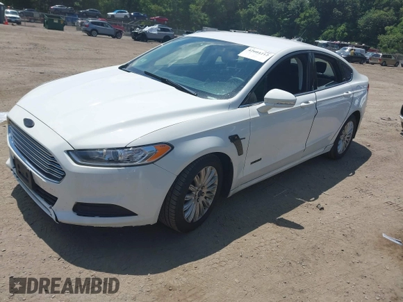 2013 Ford Fusion SE Hybrid with VIN 3FA6P0LU3DR328786, listed as a IAAI auction lot 42604212 with 132,423 mi miles and . Bid and sale history available at DreamBid. Image 2.