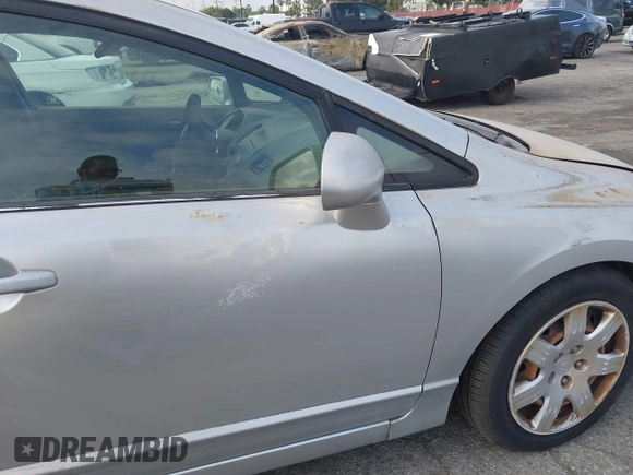 2006 Honda Civic LX with VIN 1HGFA165X6L144003, listed as a IAAI auction lot 42115624 with 310,261 mi miles and . Bid and sale history available at DreamBid. Image 17.