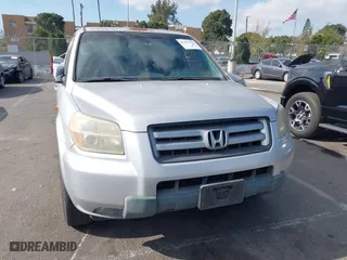 2008 Honda Pilot EX-L with VIN 5FNYF28558B012817, listed as a IAAI auction lot 41353216 with 233,854 mi miles. Bid and sale history available at carsss.com. Image 6.