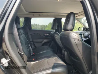 2019 Jeep Cherokee High Altitude with VIN 1C4PJMDX2KD283992, listed as a Copart auction lot 59849195 with 103,463 mi miles and Salvage title. Bid and sale history available at DreamBid. Image 11.