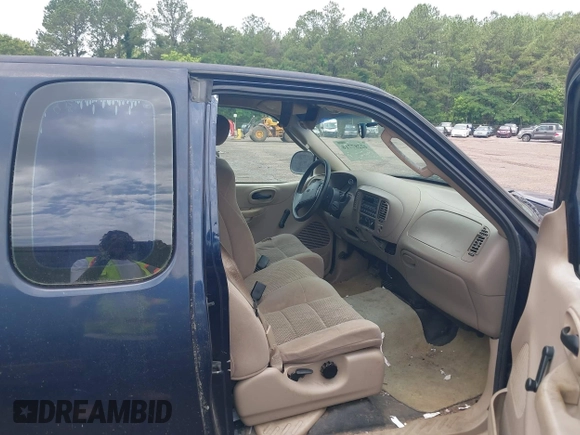 2002 Ford F-150 XL with VIN 1FTRX17282NB52453, listed as a IAAI auction lot 42287716 with 76,033 mi miles and . Bid and sale history available at DreamBid. Image 5.