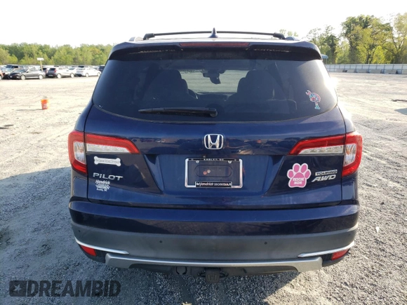 2019 Honda Pilot Touring 8-Passenger z VIN 5FNYF6H90KB000303, wystawiony jako Copart lot #52410585 z przebiegiem 129 190 mil mil oraz Szkoda całkowita • Salvage title. Historia ofert i sprzedaży dostępna na DreamBid. Obrazek 6.